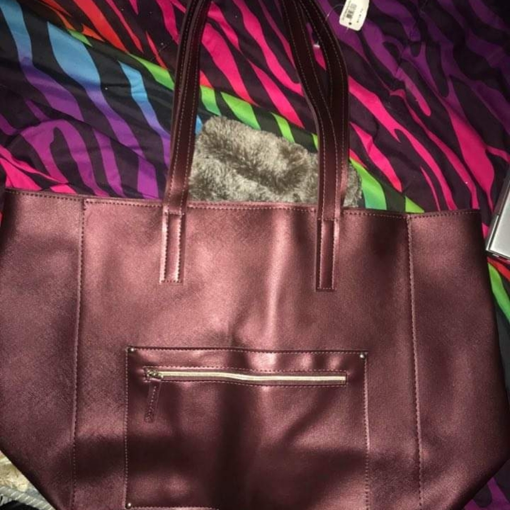 A burgundy purse